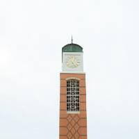 group walking towards clocktower